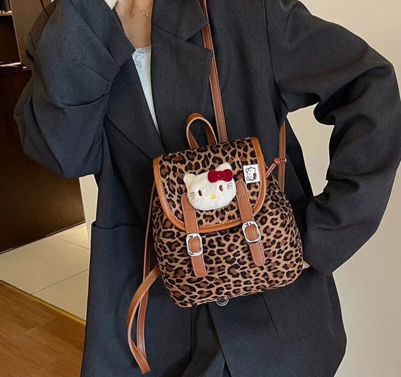 MOCHILA ANIMAL PRINT HELLO KITTY