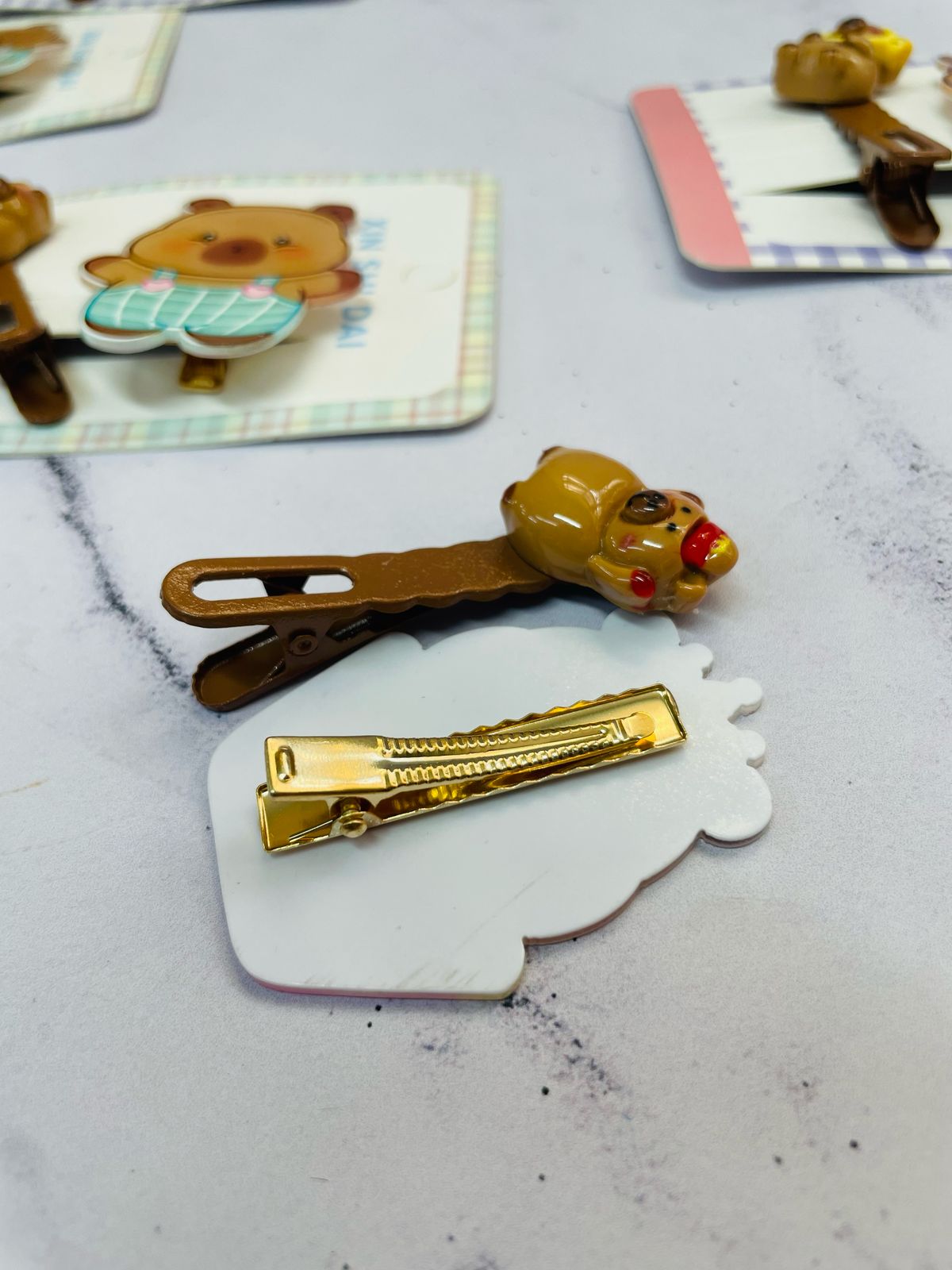 PINZA CABELLO CAPYBARA